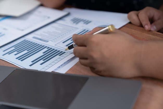 Photo analyst team colleague discuss financial data on digital dashboard enthusiastic