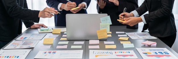 Photo analyst team use sticky note for financial analyzing prodigy