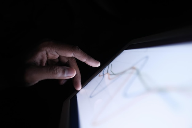 Photo analyzing chart on digital tablet