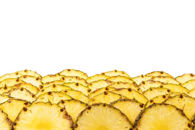 Ananas sappige gele plakjes achtergrond Bovenaanzicht