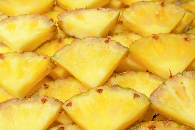 Ananas sappige gele plakjes als achtergrond