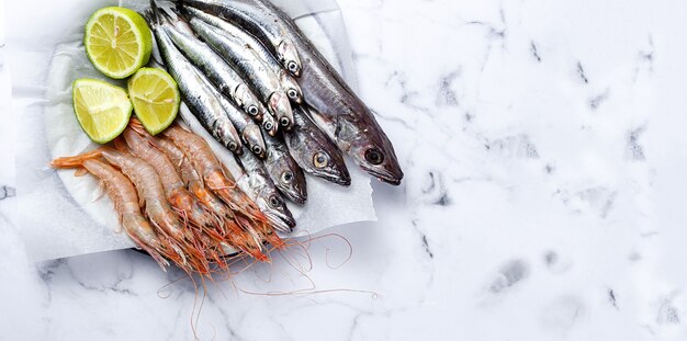 Anchovies, prawns and raw whiting prepared for frying