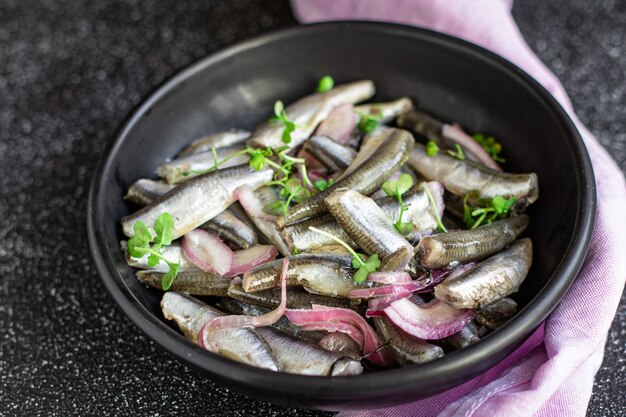 анчоусы рыба морепродукты маринованный салат закуска сельдь мелкая