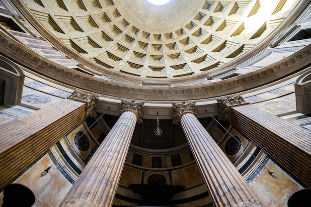 Ancient architectural masterpiece of pantheon in roma, italy. panorama of inside interior. dome. rome, italy