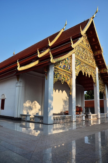 Ancient architecture antique building ubosot for thai people and foreign travelers travel visit and respect praying buddha blessing holy worship of Wat Si Khom Kham buddhist temple in Phayao Thailand