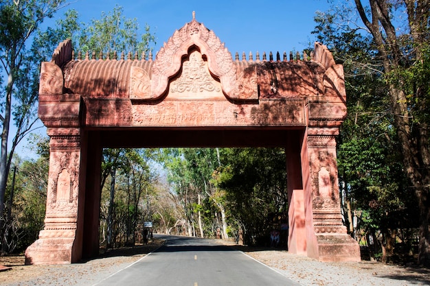 Ancient art entrance gate for thai people travelers journey pass travel visit respect praying blessing wish worship buddha on mountain at Phanom Sawai Forest Park on January 5 2024 in Surin Thailand