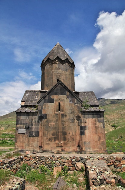 The ancient black churhc in the mountains of the Caucasus, Armenia