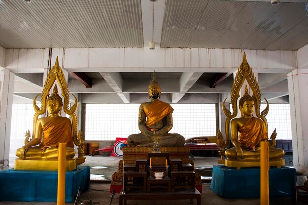 Ancient buddha statue Luang Phor Phet in antique ubosot of Wat Tha It temple for thai people travelers travel visit respect praying blessing holy wish mystery at Angthong city in Ang Thong Thailand