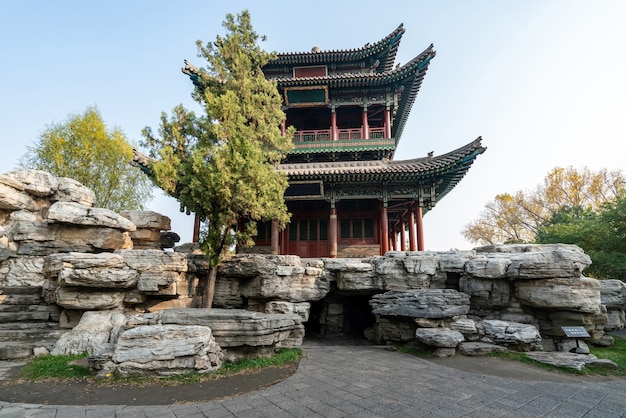 Ancient buildings and natural scenery in the park in autumn