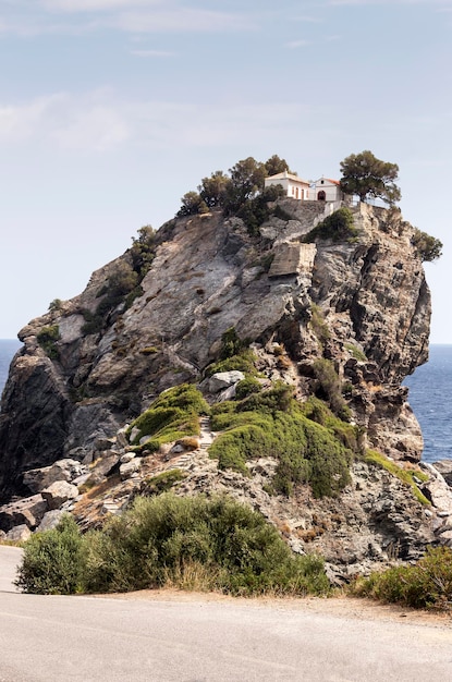 Ancient church on a rock with a staircase near the sea Skopelos island Greece Northern Sporades