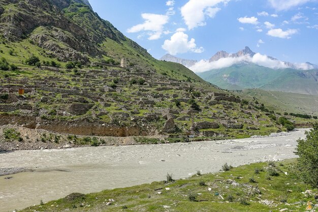 The ancient city of Kunlum in the gorge of the Cherek River in the vicinity of the Ushtulu tract Caucasus June 2021