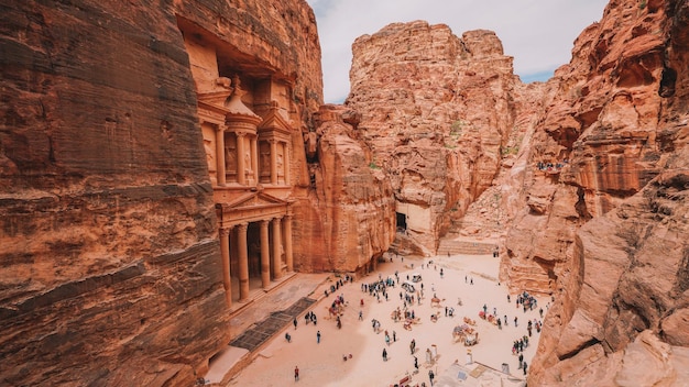 The ancient city of petra is located in the mountains of jordan.