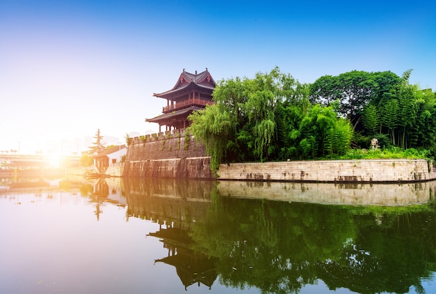 Ancient City Wall by the river with a sunset view