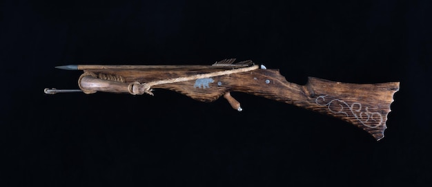 ancient crossbow isolated on black background