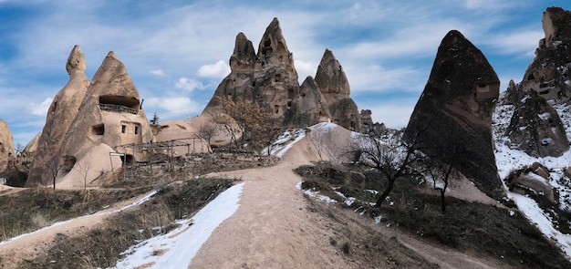 Ancient dwellings hollowed out in volcanic rock in Cappadocia, Turkey.