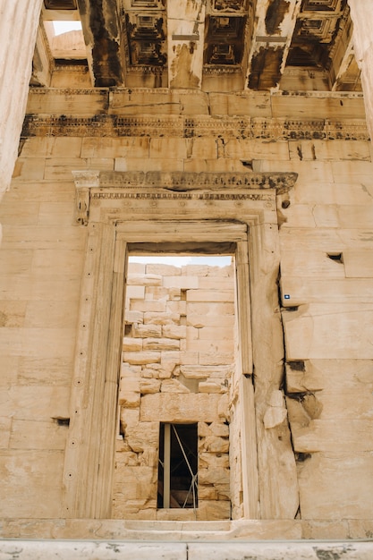 Ancient Greek ruins of Propylaea on a top of Acropolis hill in Athens