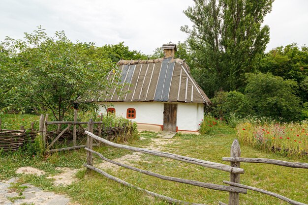 Ancient houses in the Ukrainian style Ukrainian village Pirogovo closeup