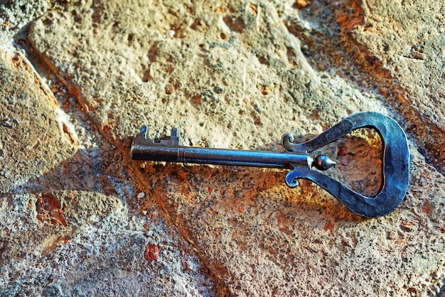 Ancient key on the stone background, Vilnius