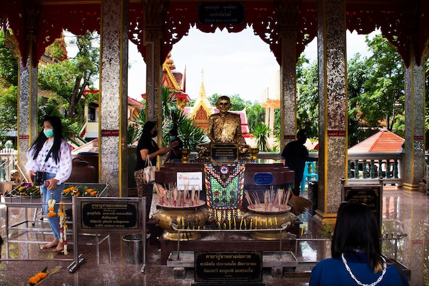 Ancient Luang Por Guay monk statue for thai people travelers travel visit and respect praying blessing holy mystery worship at Wat Kositaram or Ban Khae temple on May 27 2020 in Chai Nat Thailand