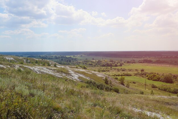 Ancient multimillion chalk mountains on the steppe surface of earth