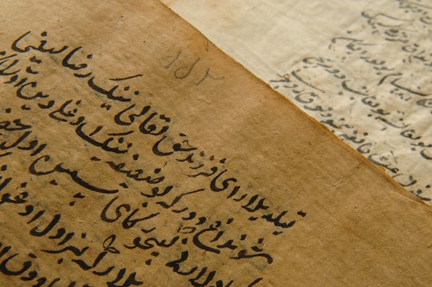 Ancient open book in arabic. Old arabic manuscripts and texts