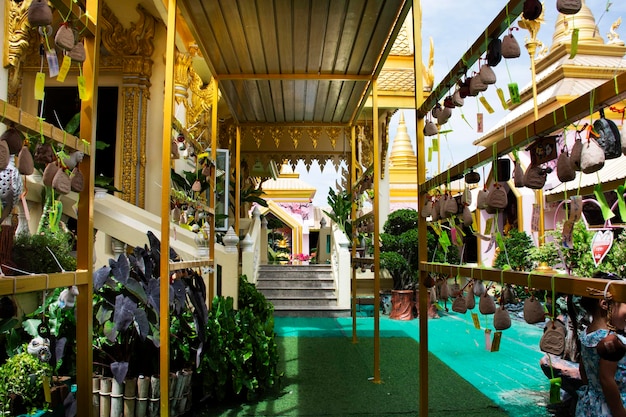 Ancient ordination hall or antique old ubosot for thai travelers people travel visit and respect praying blessing wish buddha statue at Wat Khao Din Temple on October 7 2023 in Suphan Buri Thailand