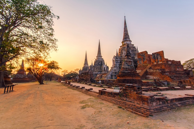 Ancient pagoda at Wat Phra Sri Sanphet temple under sunset time