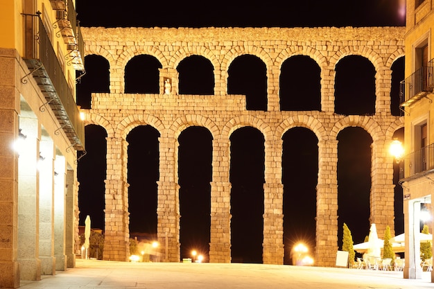 Ancient Roman aqueduct in Segovia at night, Spain