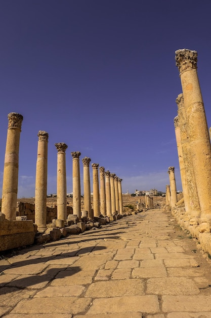 Ancient Roman ruins walkway along the columns in Jerash Jordan