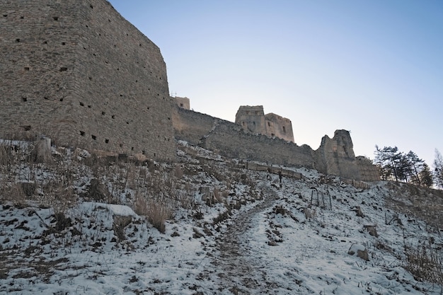 Ancient ruined European castle with several empty window