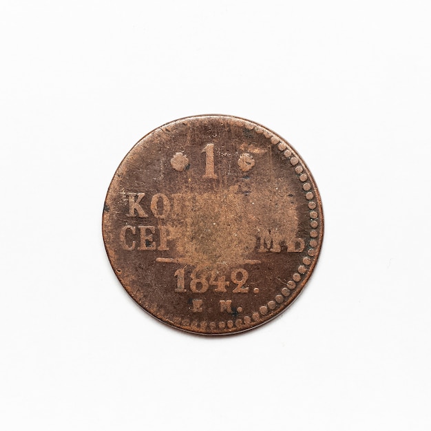 Ancient Russian coin of 1842. Isolated on white surface.