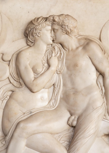 Ancient sculpture with kissing couple Florence Italy