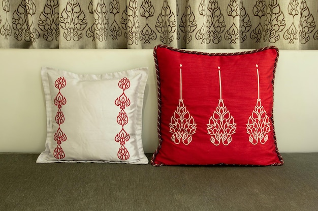 Photo ancient style of two fabric pillow on the sofa