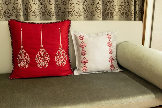 Photo ancient style of two fabric pillow on the sofa