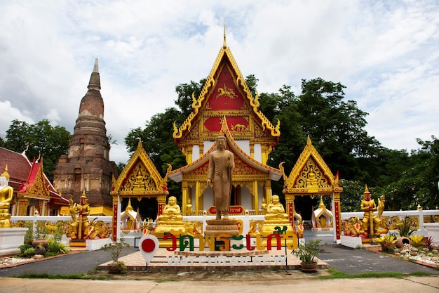 Ancient ubosot and ruin stupa or chedi and antique buddha statue for thai people travel visit praying blessing holy mystery of Wat Phra Kaew temple at Chainat city on May 27 2020 in Chai Nat Thailand