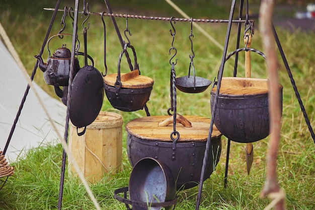 Photo ancient viking iron utensils at a festival in denmark