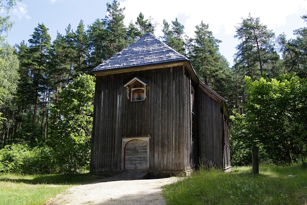 Ancient wooden church with a bell Latvia