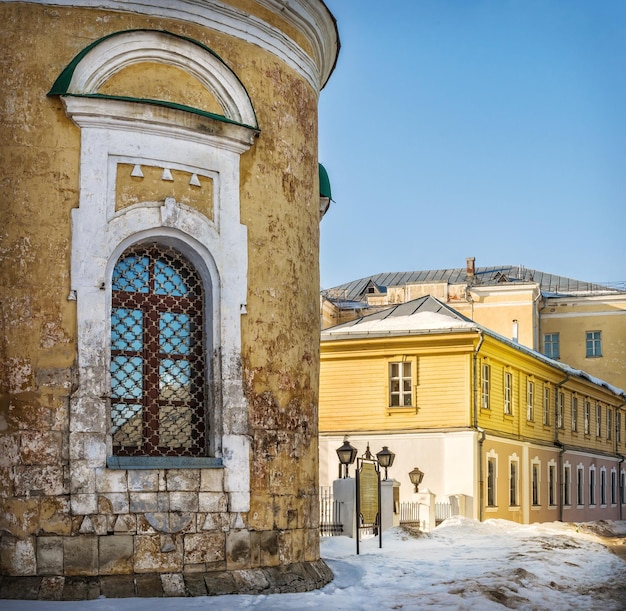 Ancient wooden and stone buildings in Vladimir on a sunny evening