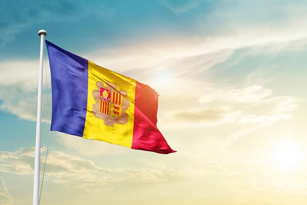 Andorra waving flag in beautiful sky.