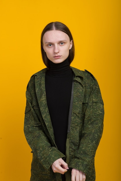 Androgynous character on a yellow