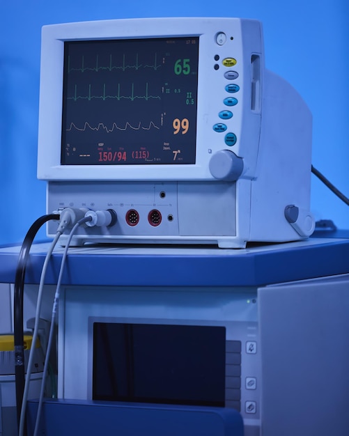 An anesthesia monitor shows real time vital signs for constant patient surveillance during surgery in a hospital including heart rate rhythm oxygenation blood pressure capnography and gas data