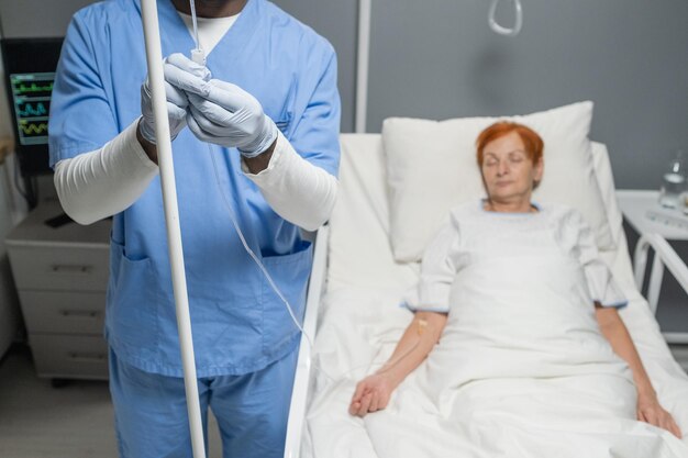 Anesthesiologist making anesthesia for woman