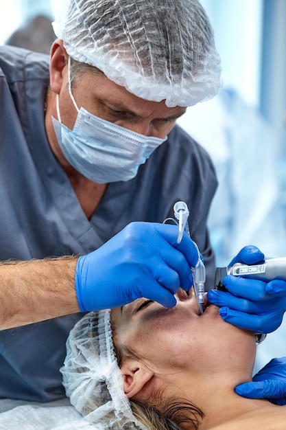 Anesthesiologist performs tracheal intubation for patient in operation room