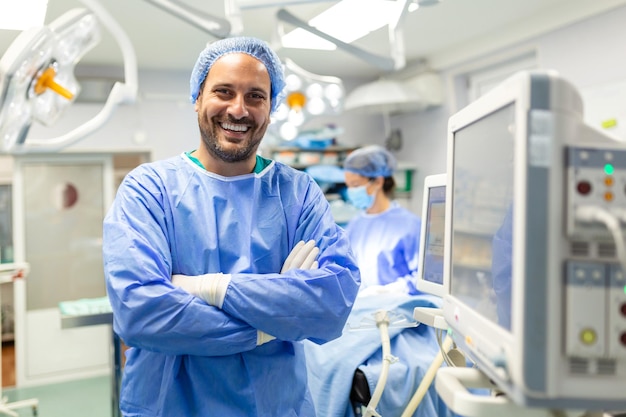 Anesthetist working in operating theatre wearing protecive gear\
checking monitors while sedating patient before surgical procedure\
in hospital