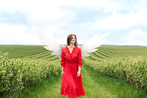 Angel in green field