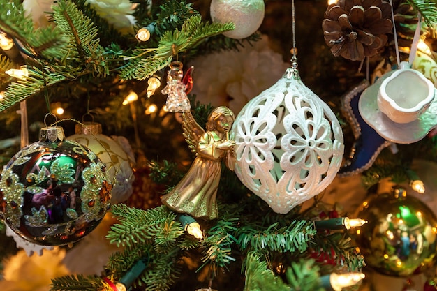 Angel toy decoration. Detailed photo of the Christmas decoration of a golden angel toy in the house.