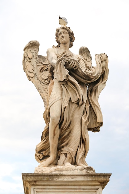 Angel with the Garment and Dice Statue in Hadrian Bridge Rome Italy