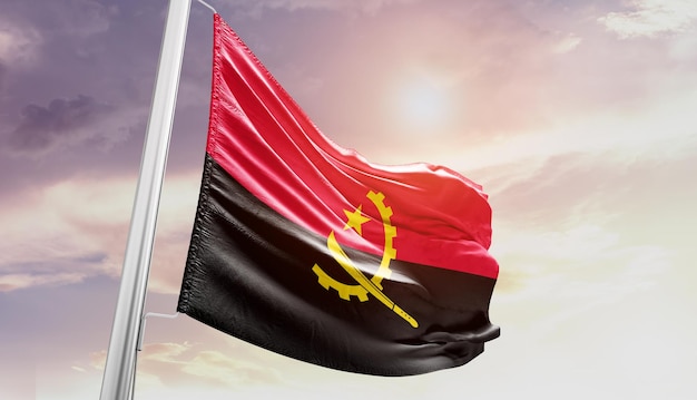 angola national flag waving in beautiful sky.