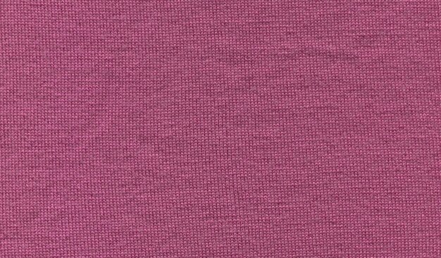 Angora cozy pink knitted fabric texture Knitting purple pink texture of sweater close up