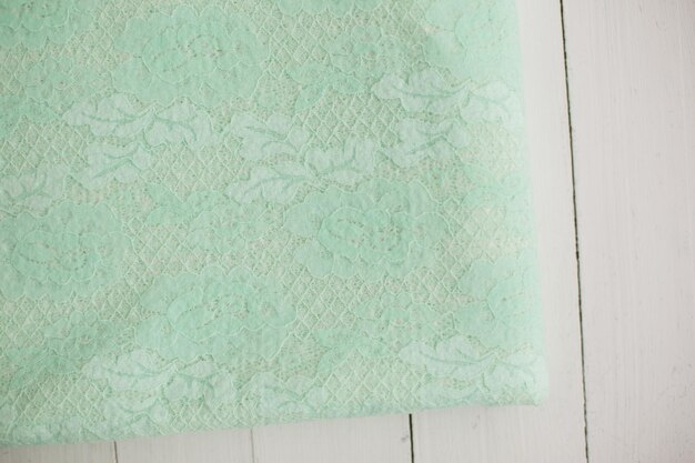 Angora fabric mint color. knitwear. background texture fabric. lace